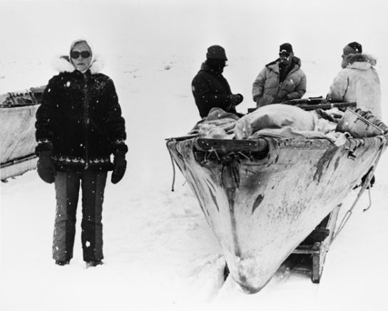 Ann Stevens and Whalers (1978). Likely in Barrow, AK; preparing the umiak for the hunt.