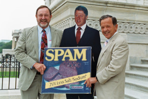 Sen. Ted Stevens and Rep. Don Young pose with a life-size cutout of then-President Bill Clinton and a giant cut out of a can of spam on the Capitol steps in July 1993 for Mr. Whitekeys Fly-By-Night Club. Ted Stevens Foundation photo.