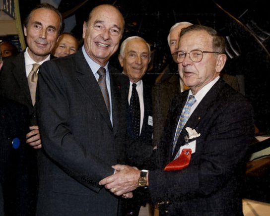 French President Jacques Chirac and Senator Stevens (2005). (photo by D. Noizet, Presidence de la Republique Francaise, Serivce Photographique, 2005-06-13)